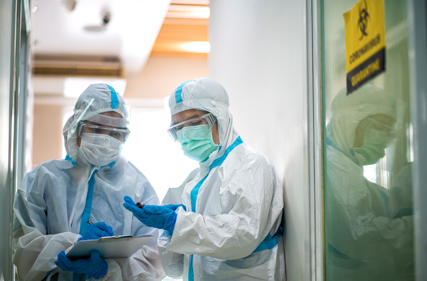 Physicians wearing full PPE to ensure hospital COVID-19 safety