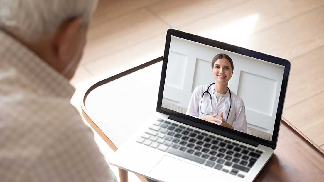 Older man enjoying telehealth in the future