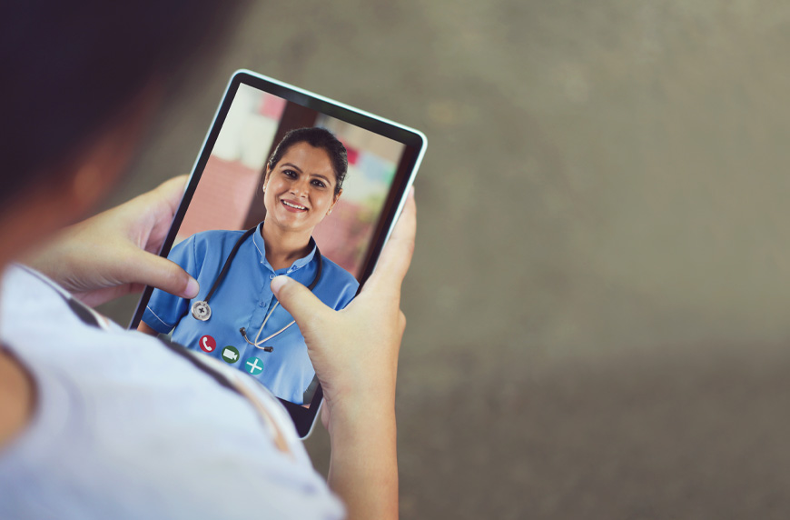 Provider doing a telehealth visit on a tablet