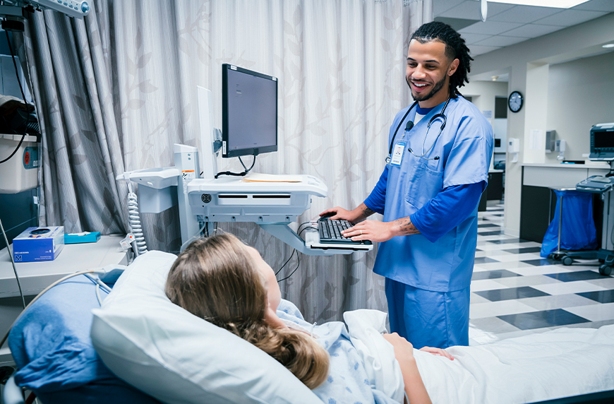 Nurse and patient experiencing the effects of the nursing shortage