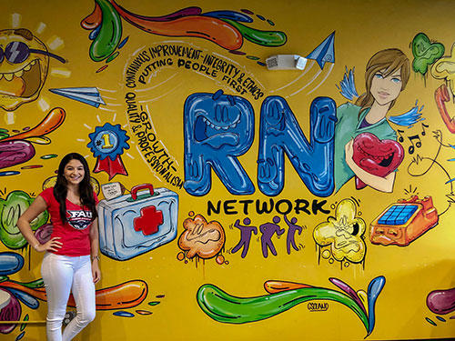 RNnetwork nurse recruiter in front of mural