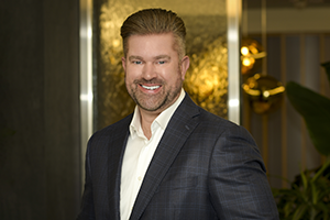 Portrait of Luke Woodyard, CHG Healthcare Group President